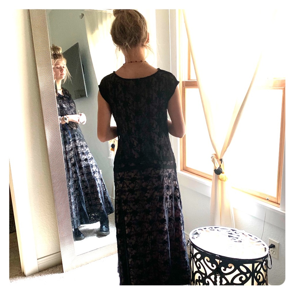 Layers lace black dress over champagne slip